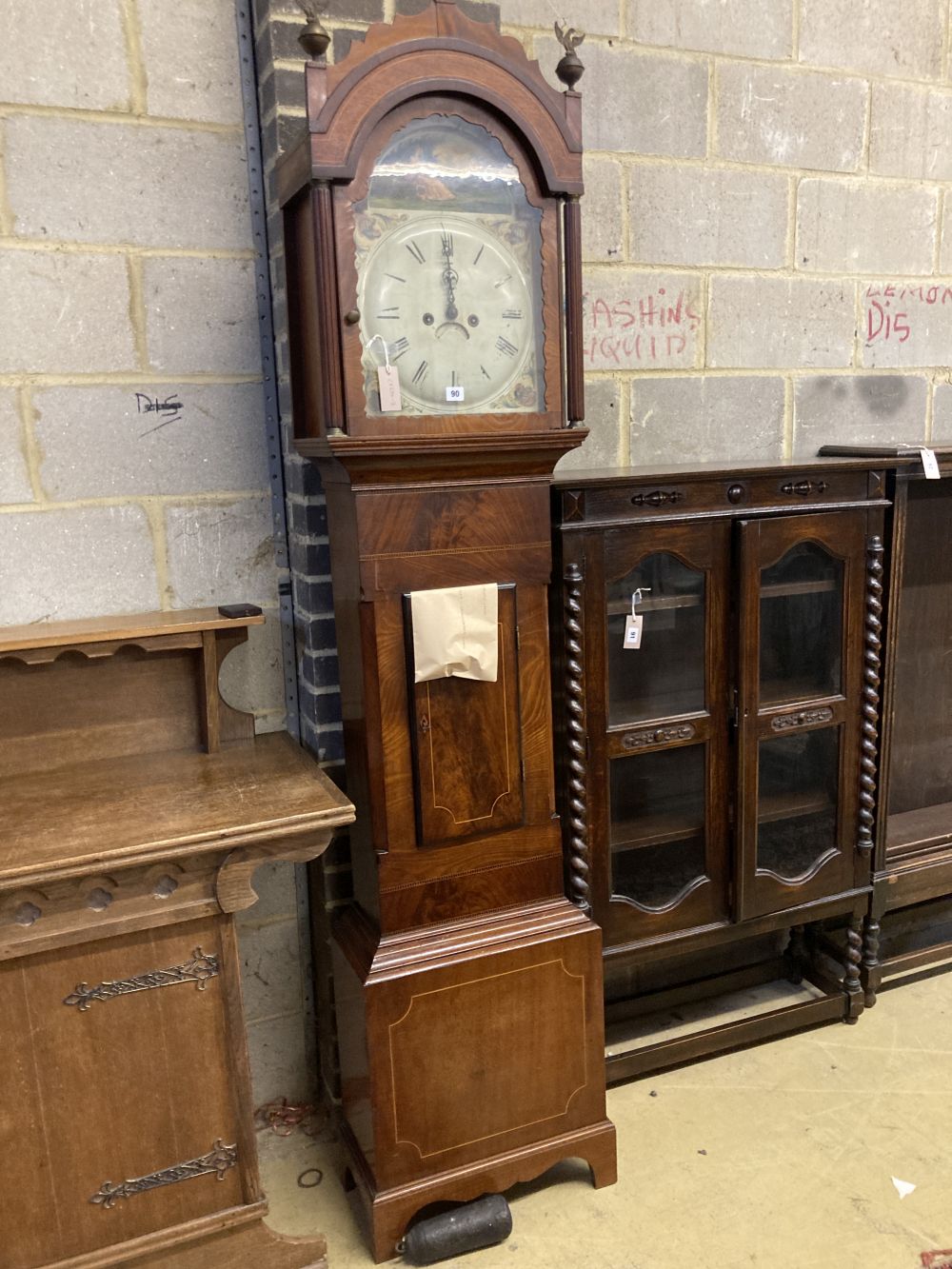 An early 19th century inlaid mahogany eight day longcase clock, height 224cm